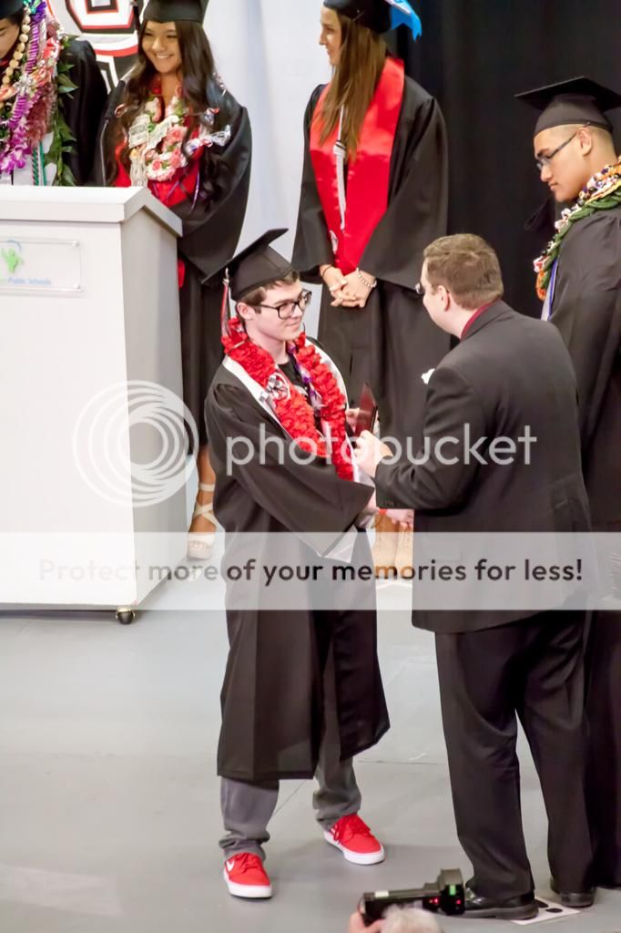 IMAGE: http://i486.photobucket.com/albums/rr224/Beefer518/Jeremy/Diploma-Handoff_zps0c0856d0.jpg